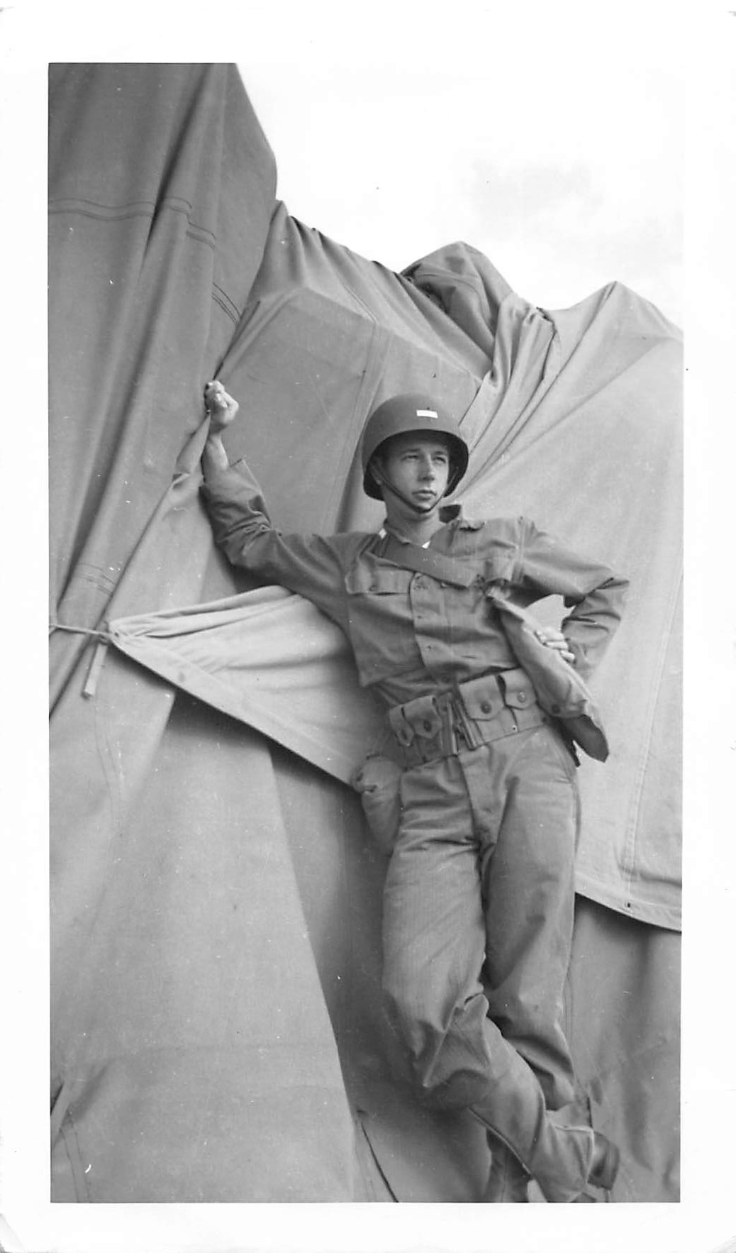 Soldier posed at tent flap