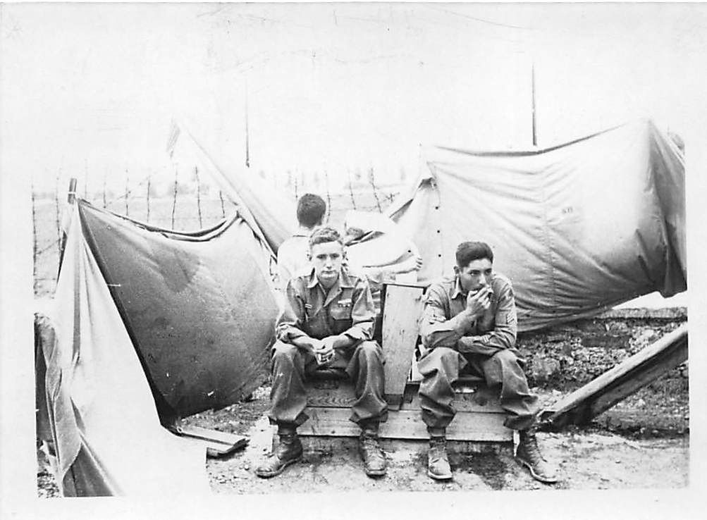 Two soldiers relaxing at tent