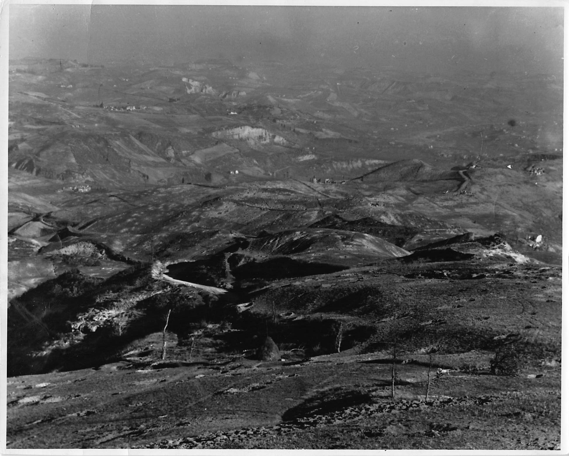 Shell-scarred rocky hillside